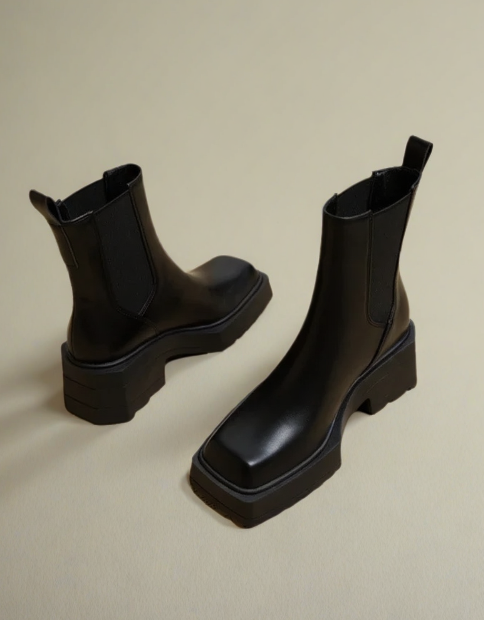 Bottes femme automne hiver en cuir noir avec semelle épaisse et design élégant