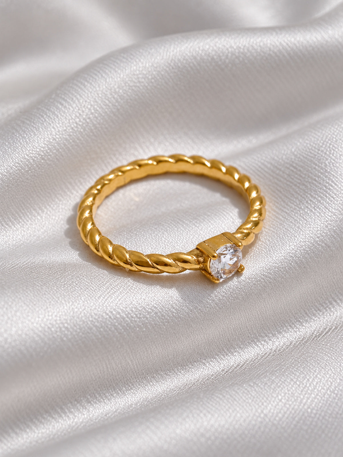 Twist Zirconia Ring — editorial still life