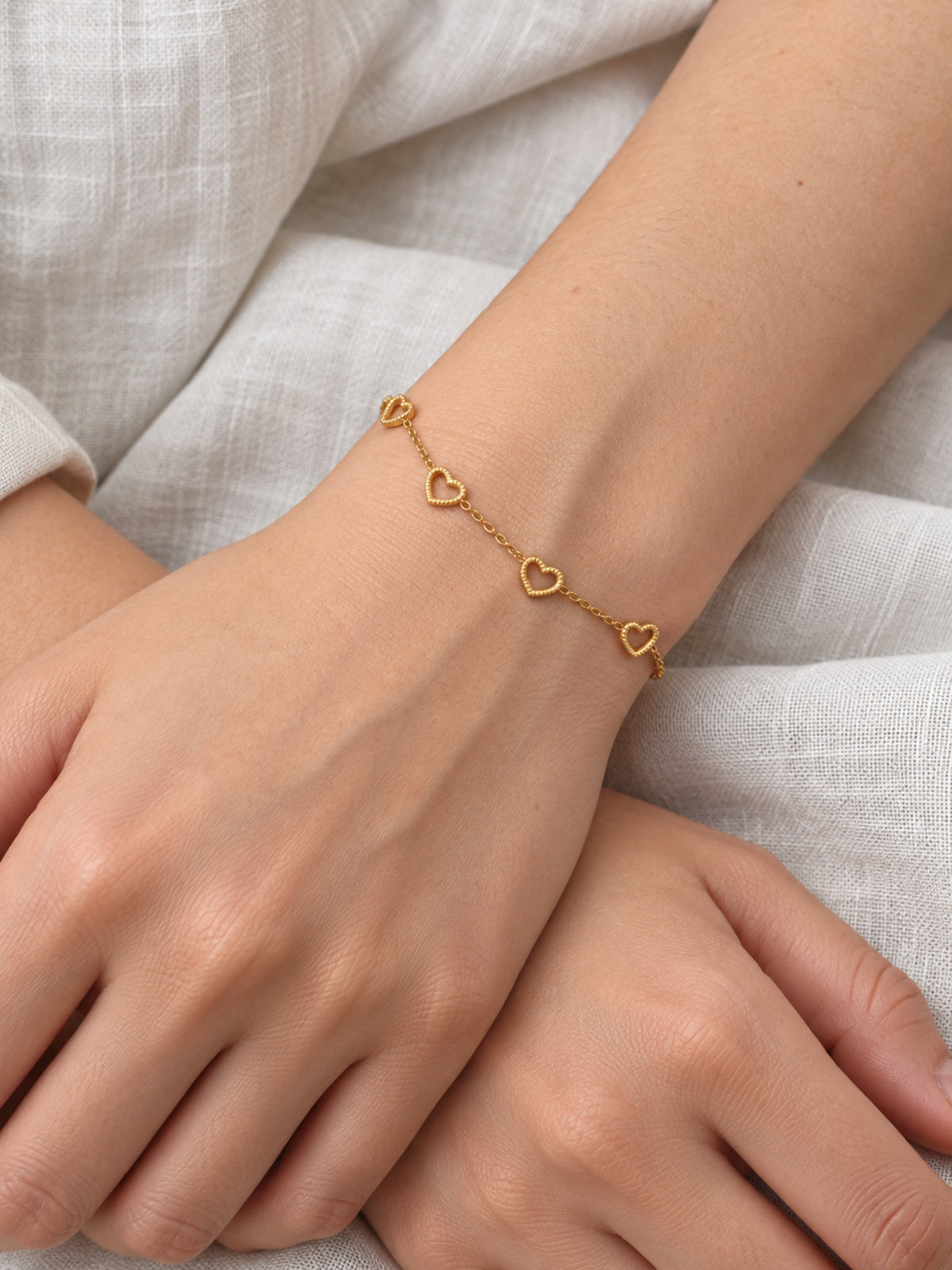 Outline Heart Bracelet — worn view