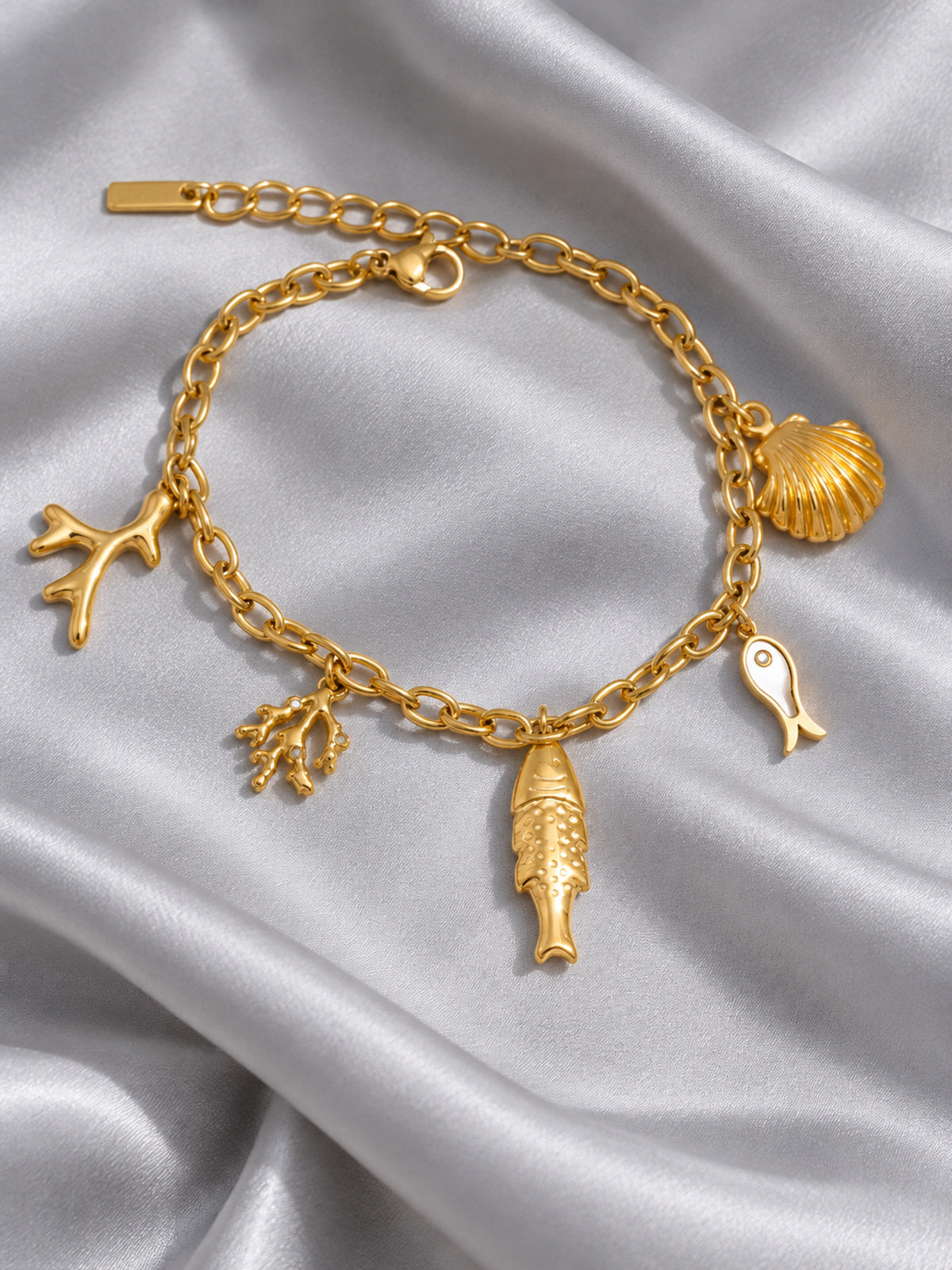 Marina Ocean Charm Bracelet — editorial still life