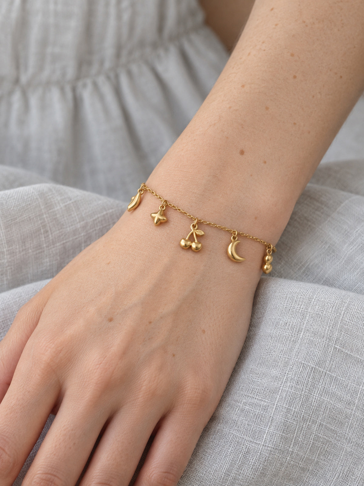 Wish Charm Bracelet — worn view