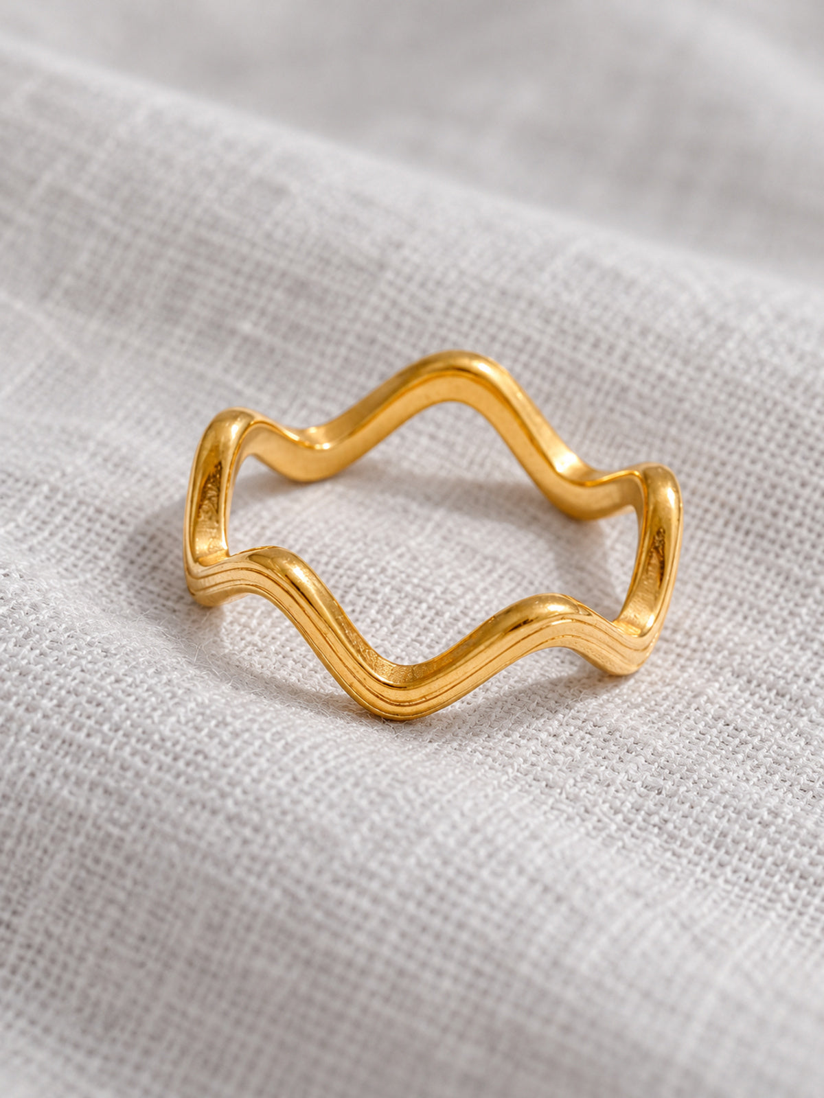 Contour Wave Ring — editorial still life