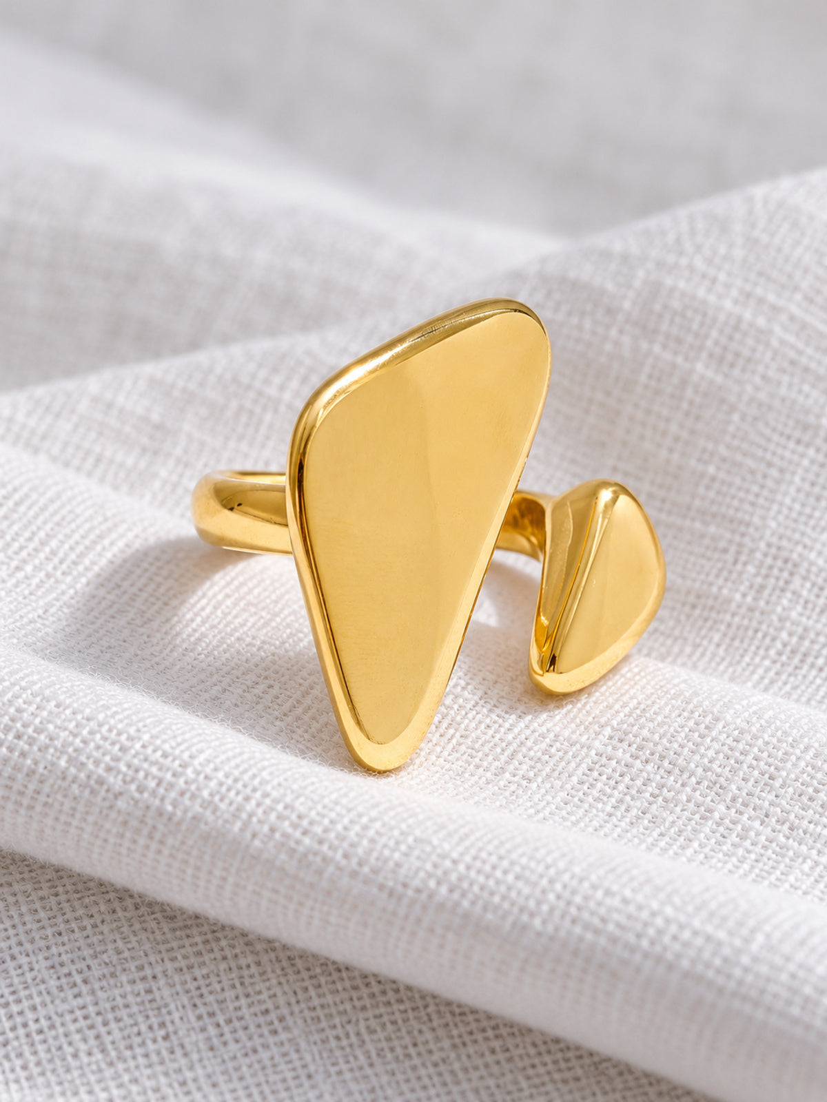 Facet Triangle Ring — editorial still life