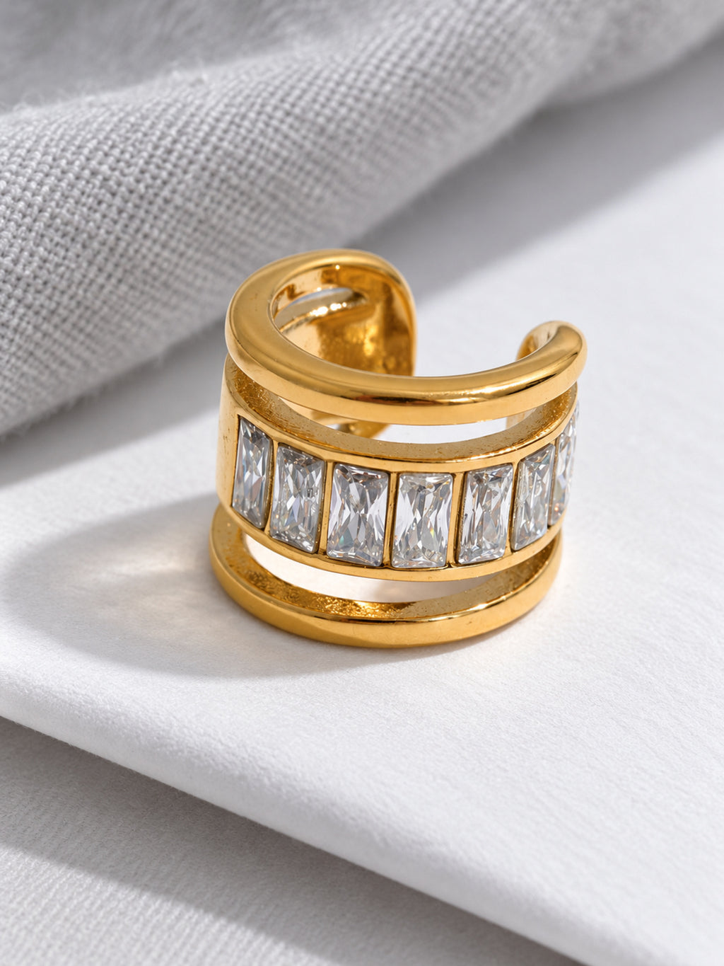 Lyra Clip Earring — editorial still life