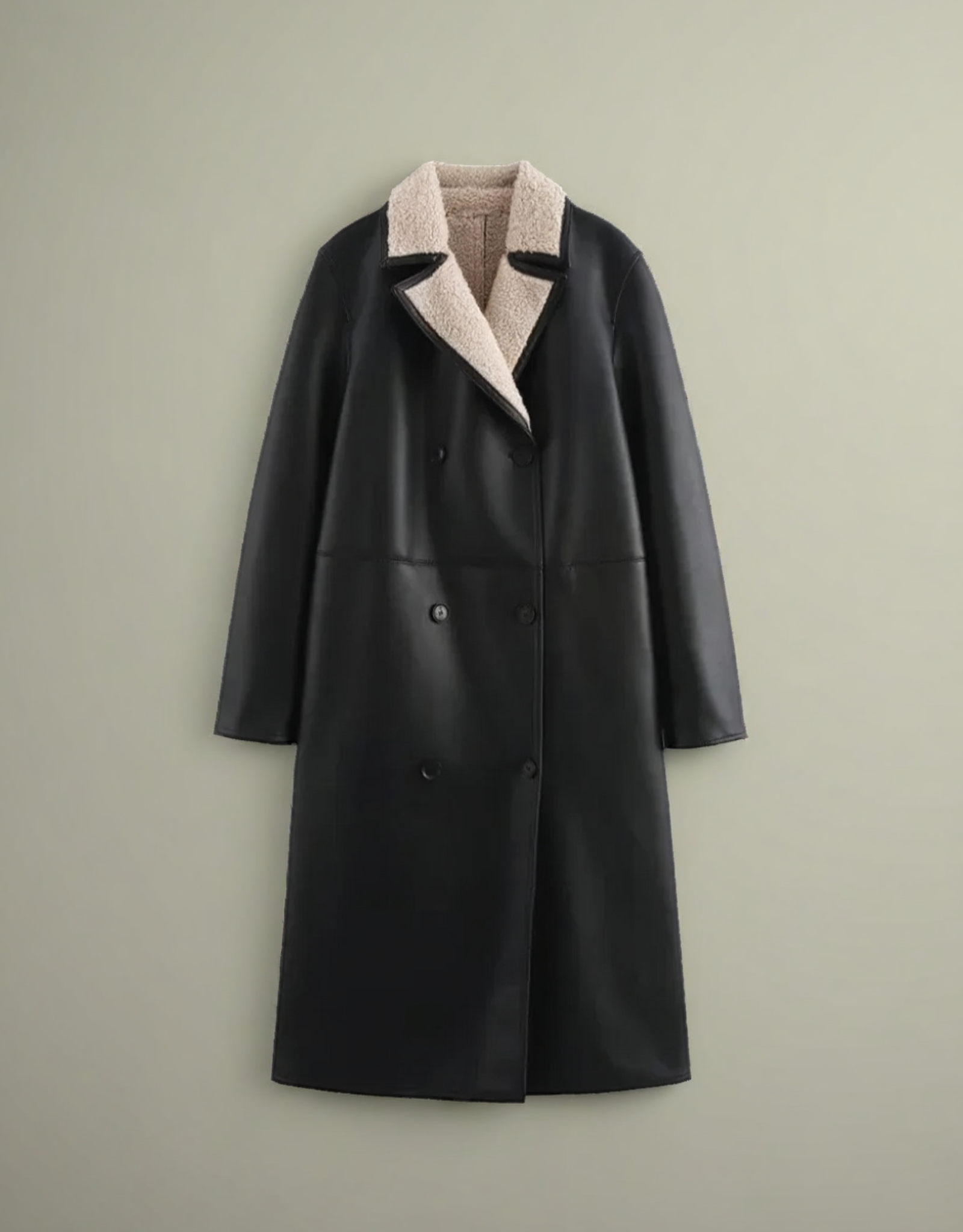 Manteau long femme élégant en cuir noir avec col en fourrure douce pour un style chic