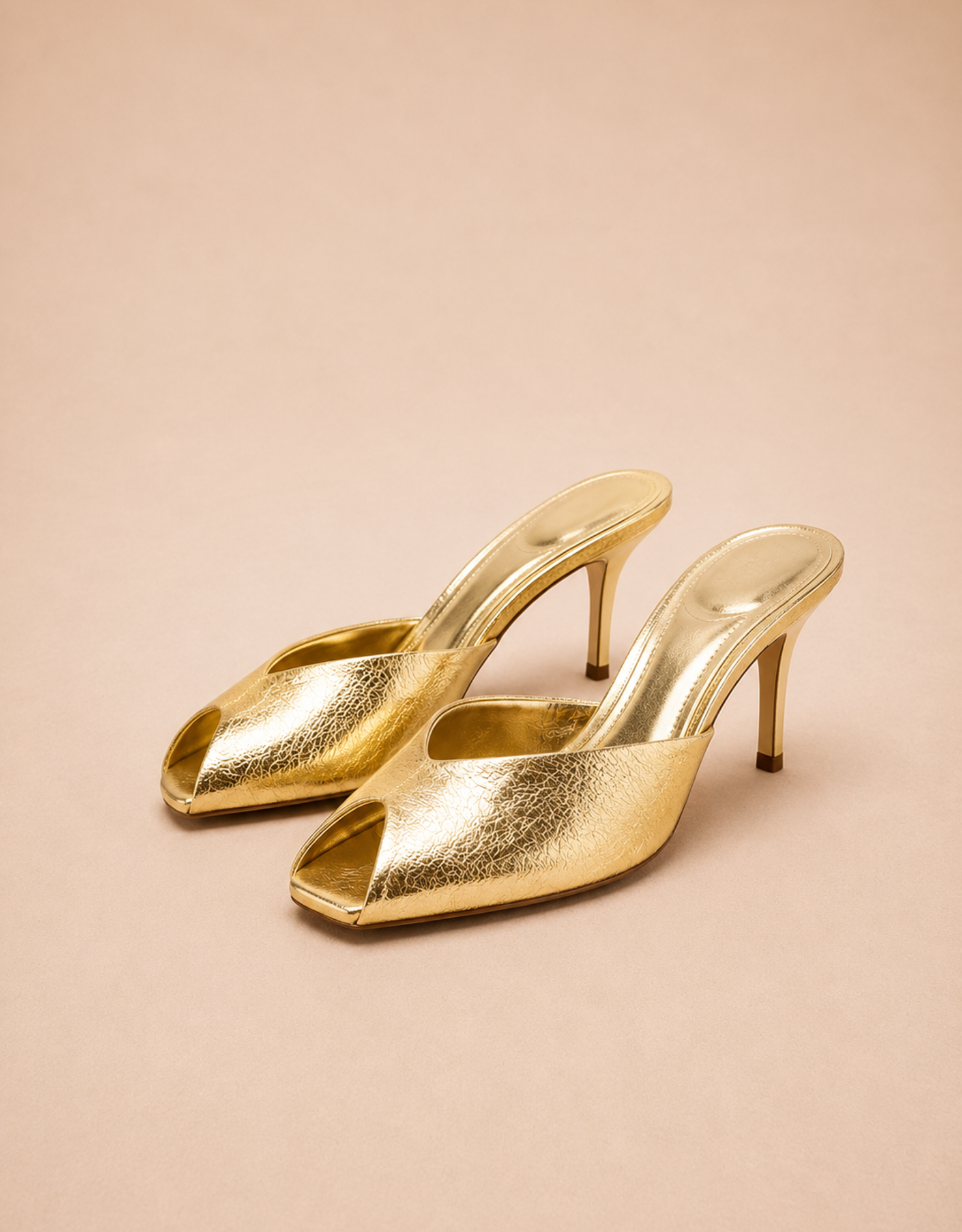 Mules femme dorées à talons ouverts avec un design élégant de Fondelier