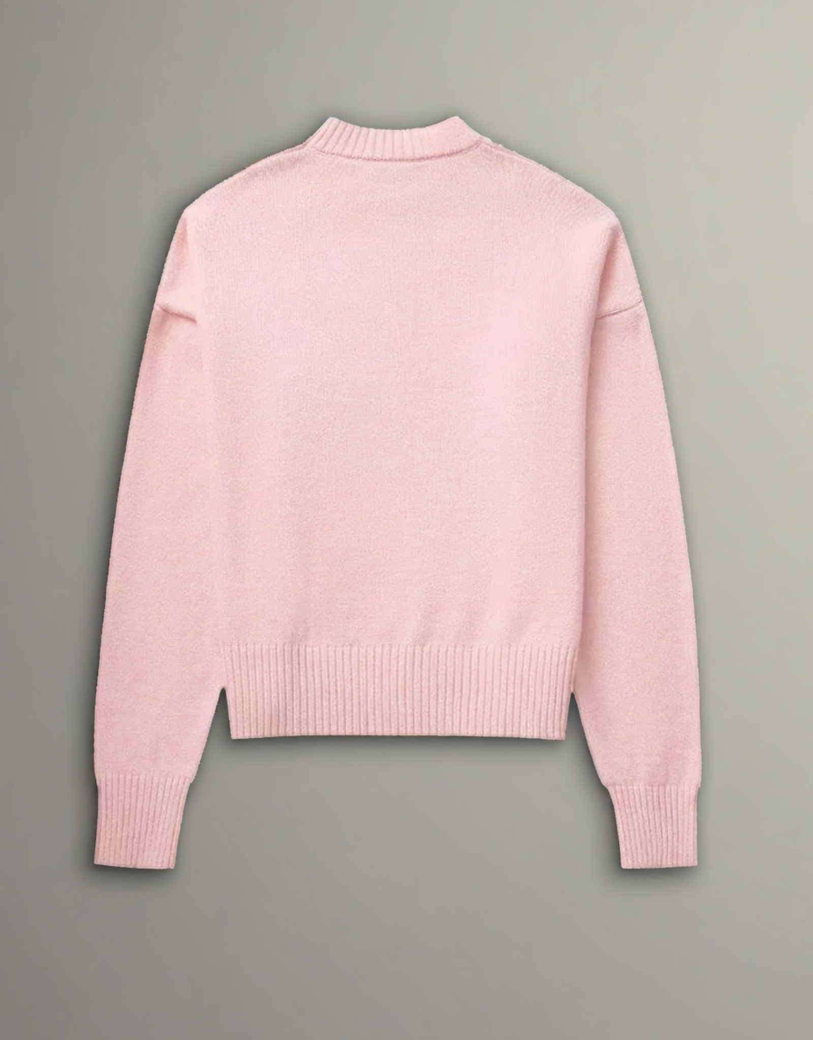 Pull rose en laine Fondelier avec col montant et finitions côtelées à l'arrière