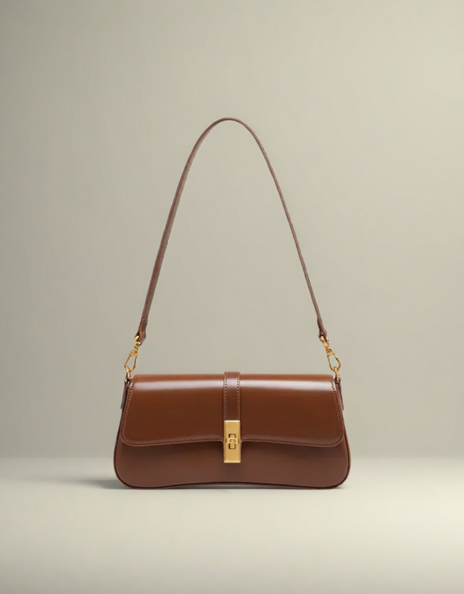 Sac baguette en cuir marron de Fondelier avec une bandoulière élégante et une fermeture dorée