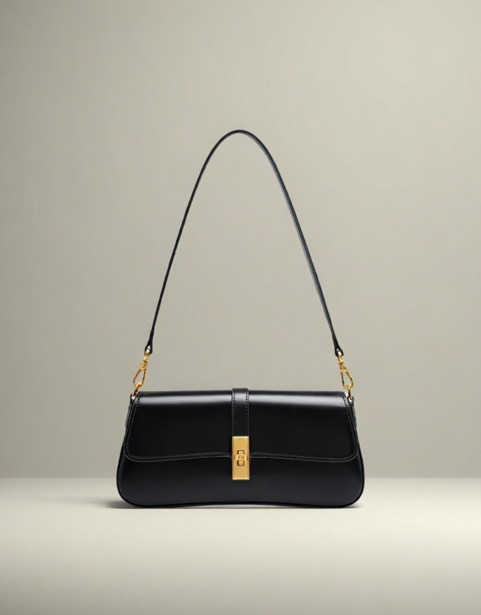 Sac baguette en cuir noir de Fondelier avec une fermeture dorée élégante