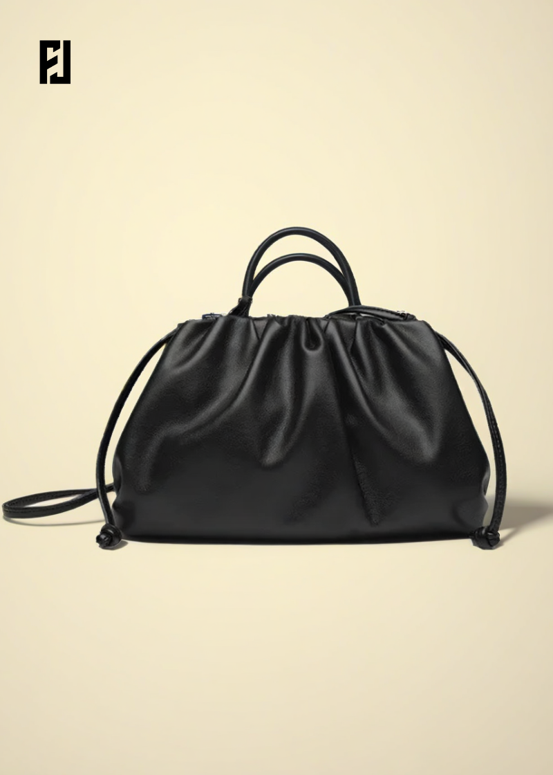 Sac bandoulière femme en cuir noir élégant avec poignées et cordon de serrage Fondelier