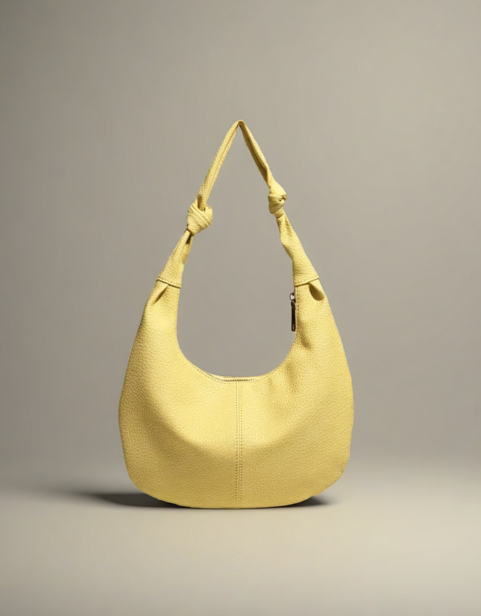 Sac demi-lune cuir femme jaune avec design élégant et bandoulière nouée
