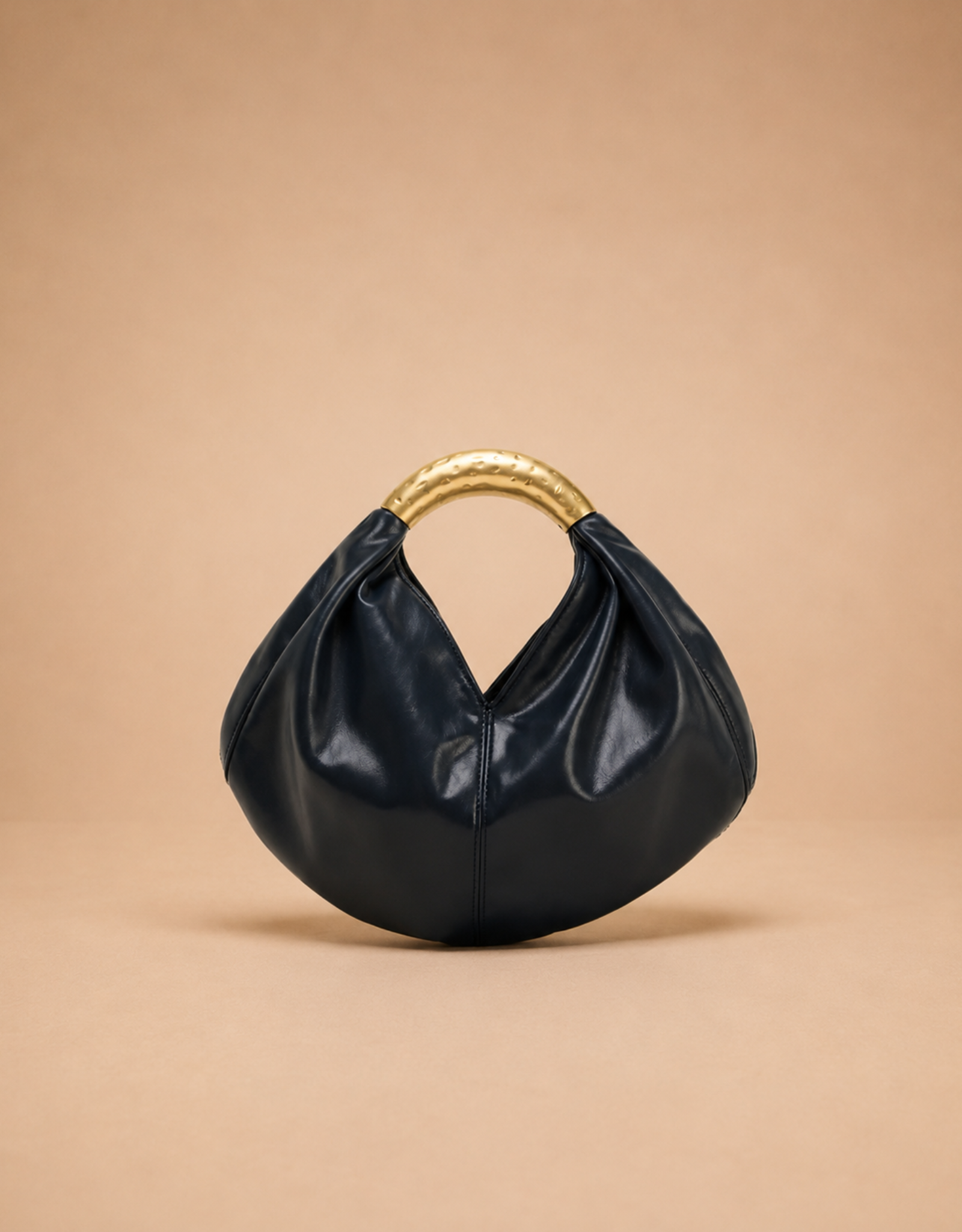 Sac en cuir noir Fondelier avec anse tressée dorée, élégant et tendance