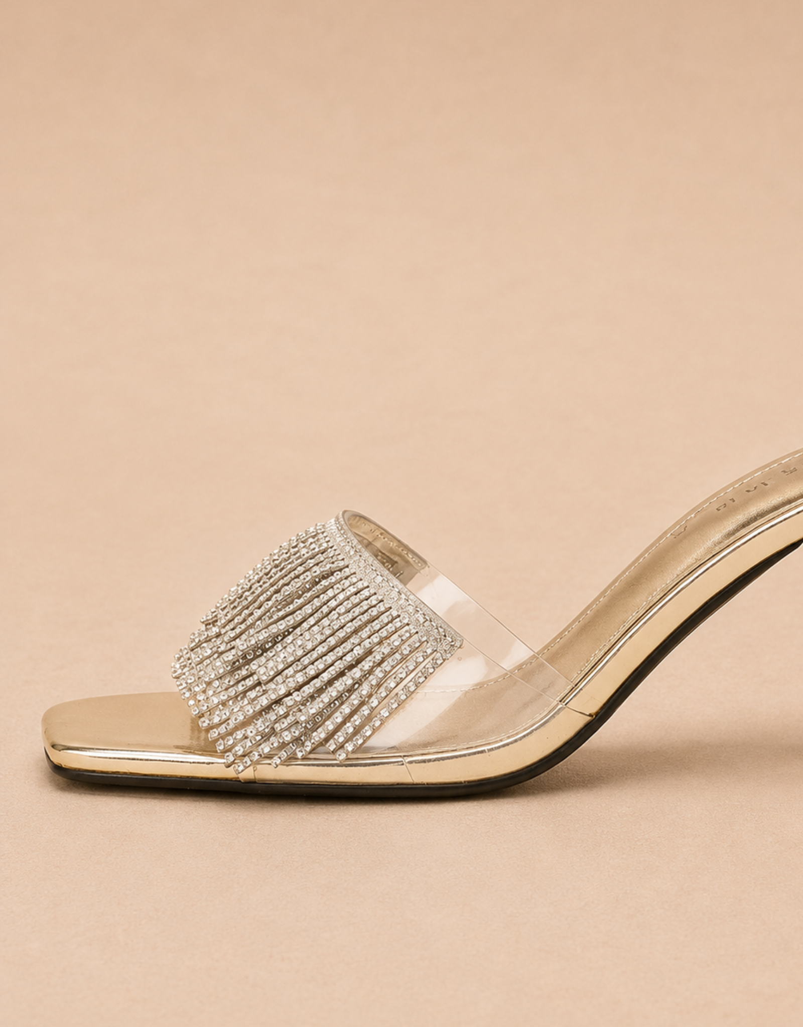 Sandales mules femme en transparent avec décor en strass pour une touche élégante